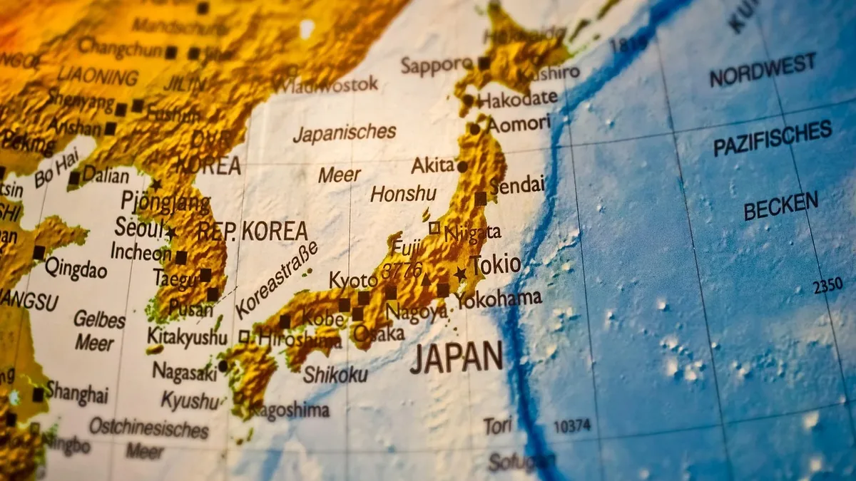 A map of Japan and the surrounding area, with the country's coastline and major cities visible.
